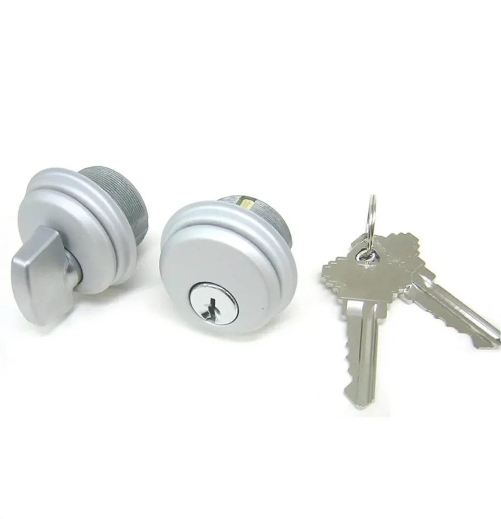 a key an outside lock and an inside lock next to eachother in a white background